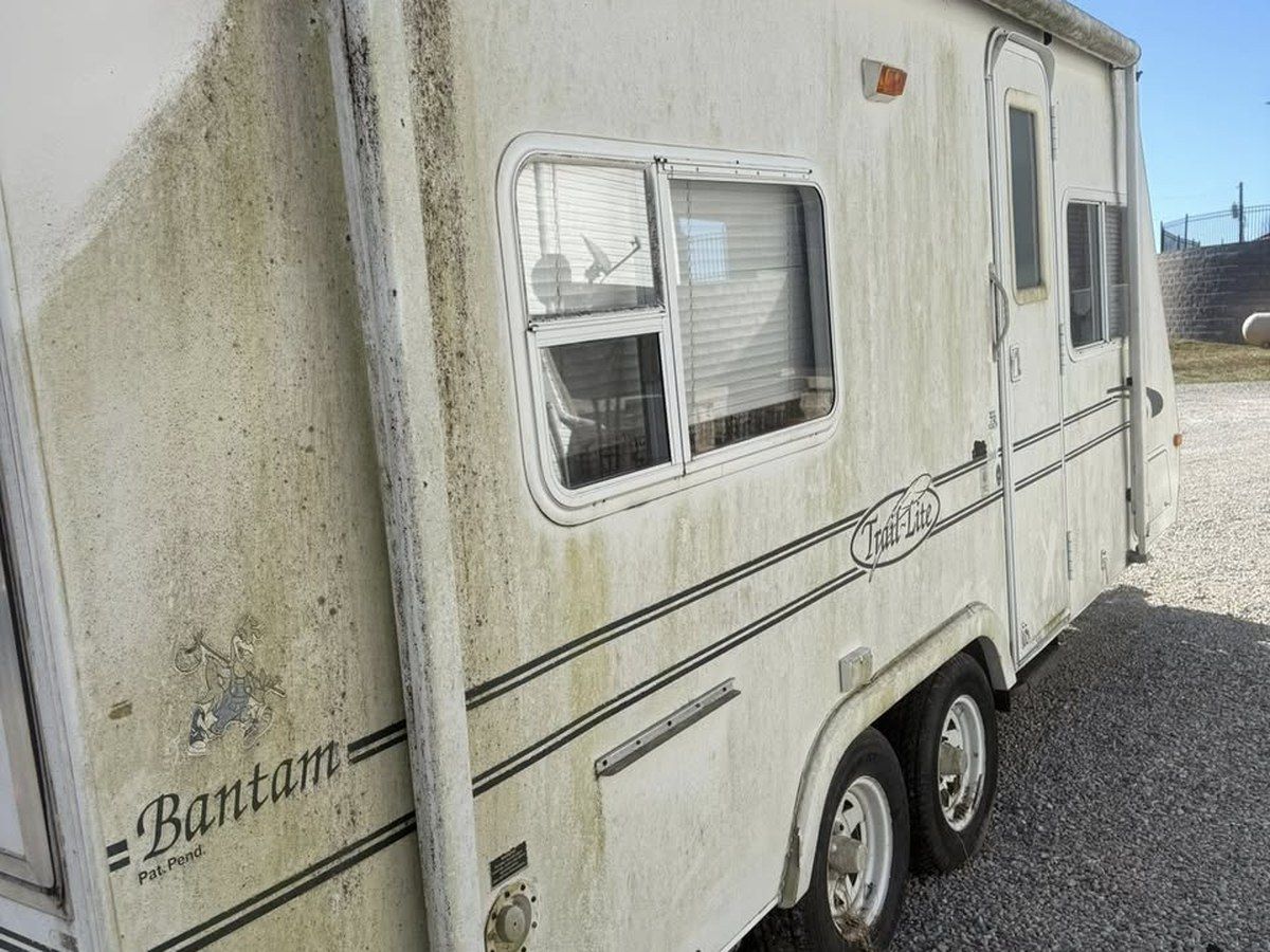 Before — Trailer with mold and algae growth